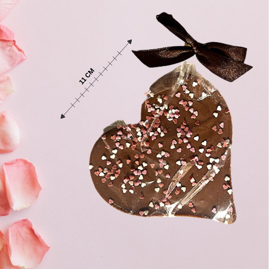 Шоколадово сърце с розов брокат